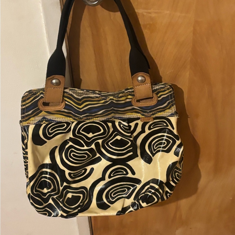 Fossil canvas and leather swirl design